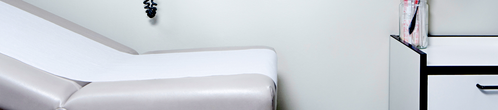 A bed in a doctor's office